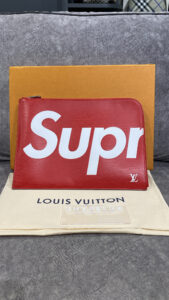 LV Supreme Clutch Red Large