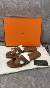Hermes Oran Sandals Gold with white trim