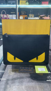 Fendi Black with Yellow Bug Eyes Clutch