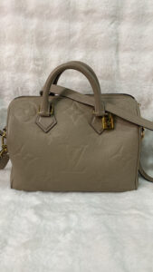 LV Bag Creme Speedy 25 Bandouliere Empreinte Leather