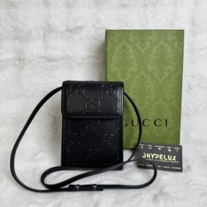 Gucci GG Embossed Calfskin Mini Bag in Black Perforated Leather